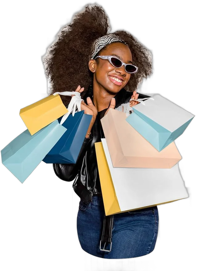 Shopper in sunglasses carrying shopping bags
